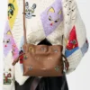 Cats mini Flamenco clutch in nappa calfskin Mocha Cats mini Flamenco clutch in nappa calfskin Mocha