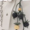 Berry charm in classic calfskin Black/Green Berry charm in classic calfskin Black/Green