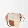 Drawstring bucket in palm leaf and calfskin Natural/Tan Drawstring bucket in palm leaf and calfskin Natural/Tan