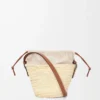 Drawstring bucket in palm leaf and calfskin Natural/Tan Drawstring bucket in palm leaf and calfskin Natural/Tan