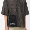 Drawstring pocket in raffia Black Drawstring pocket in raffia Black