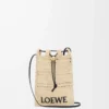 Drawstring pocket in raffia Natural/Black Drawstring pocket in raffia Natural/Black