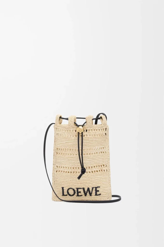 Drawstring pocket in raffia Natural/Black Drawstring pocket in raffia Natural/Black