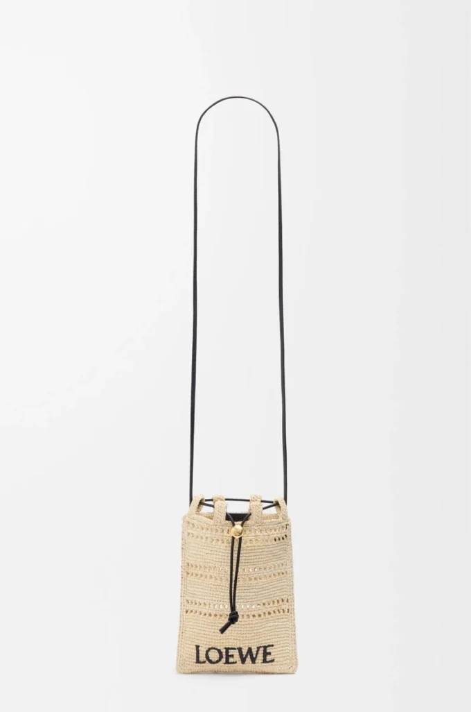 Drawstring pocket in raffia Natural/Black Drawstring pocket in raffia Natural/Black