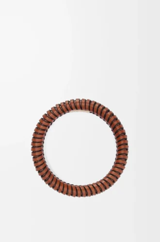 Interlock bangle in classic calfskin Tan
