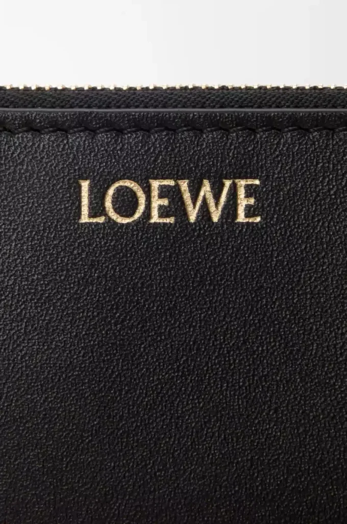 Knot coin cardholder in shiny nappa calfskin Black/Squirrel