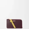 Knot coin cardholder in shiny nappa calfskin Dark Burgundy/Light Citrine Knot coin cardholder in shiny nappa calfskin Dark Burgundy/Light Citrine