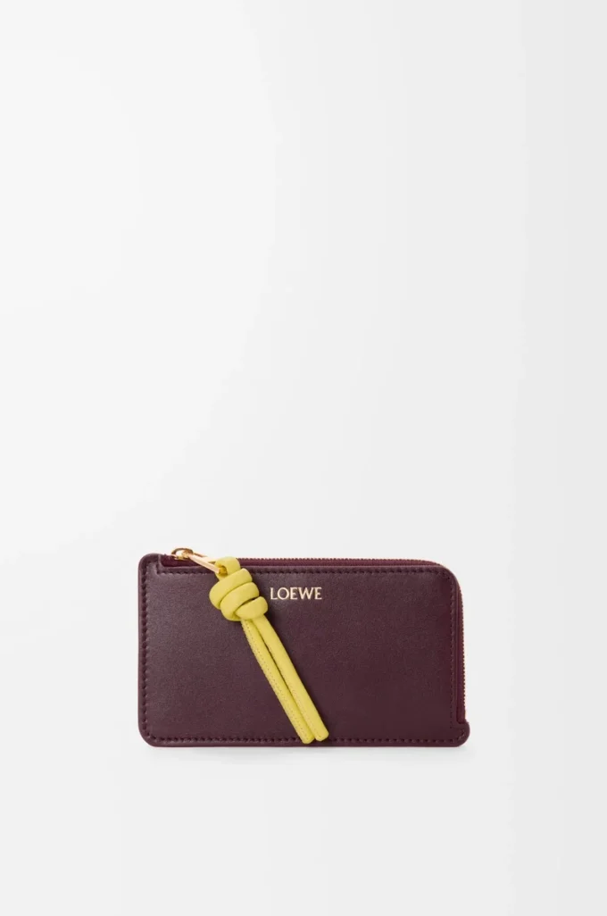Knot coin cardholder in shiny nappa calfskin Dark Burgundy/Light Citrine Knot coin cardholder in shiny nappa calfskin Dark Burgundy/Light Citrine
