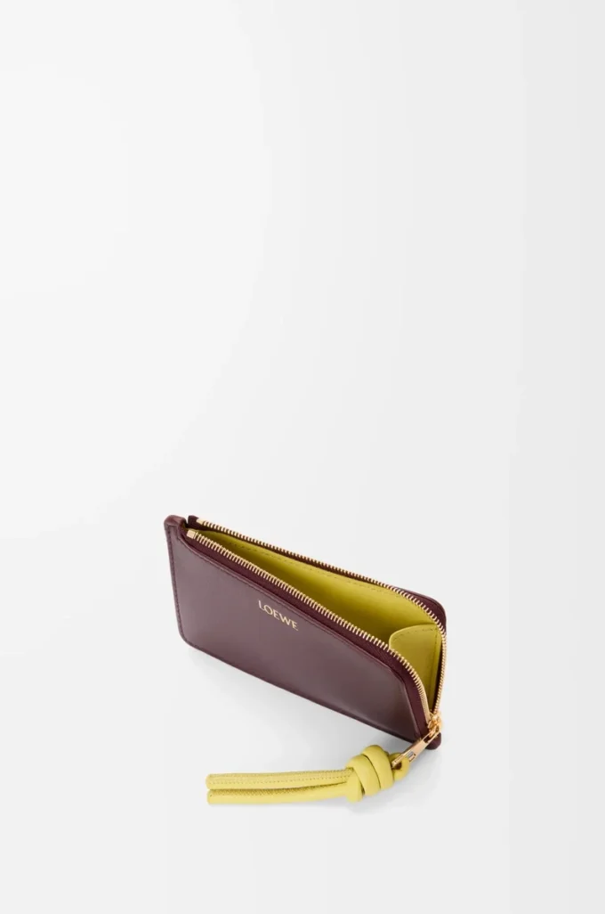 Knot coin cardholder in shiny nappa calfskin Dark Burgundy/Light Citrine Knot coin cardholder in shiny nappa calfskin Dark Burgundy/Light Citrine