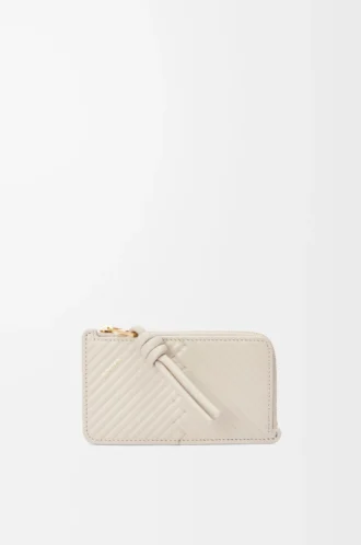 Knot coin cardholder in shiny nappa calfskin Light Oat