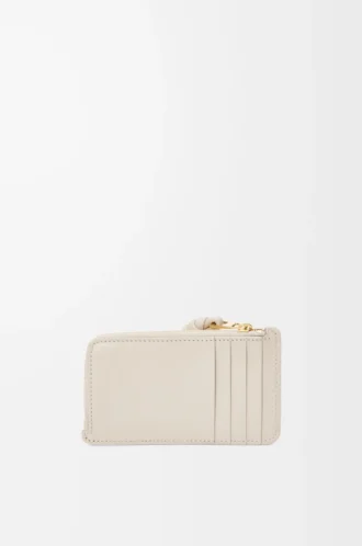 Knot coin cardholder in shiny nappa calfskin Light Oat