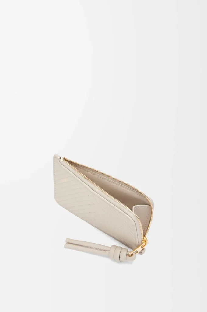 Knot coin cardholder in shiny nappa calfskin Light Oat
