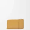 Knot coin cardholder in shiny nappa calfskin Sahara/Crimson Knot coin cardholder in shiny nappa calfskin Sahara/Crimson