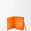 Knot compact wallet in shiny nappa calfskin Black/Bright Orange Knot compact wallet in shiny nappa calfskin Black/Bright Orange