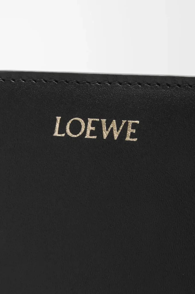 Knot compact wallet in shiny nappa calfskin Black/Bright Orange Knot compact wallet in shiny nappa calfskin Black/Bright Orange