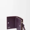 Knot compact wallet in shiny nappa calfskin Clay/Plum Knot compact wallet in shiny nappa calfskin Clay/Plum