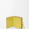 Knot compact wallet in shiny nappa calfskin Dark Burgundy/Light Citrine Knot compact wallet in shiny nappa calfskin Dark Burgundy/Light Citrine