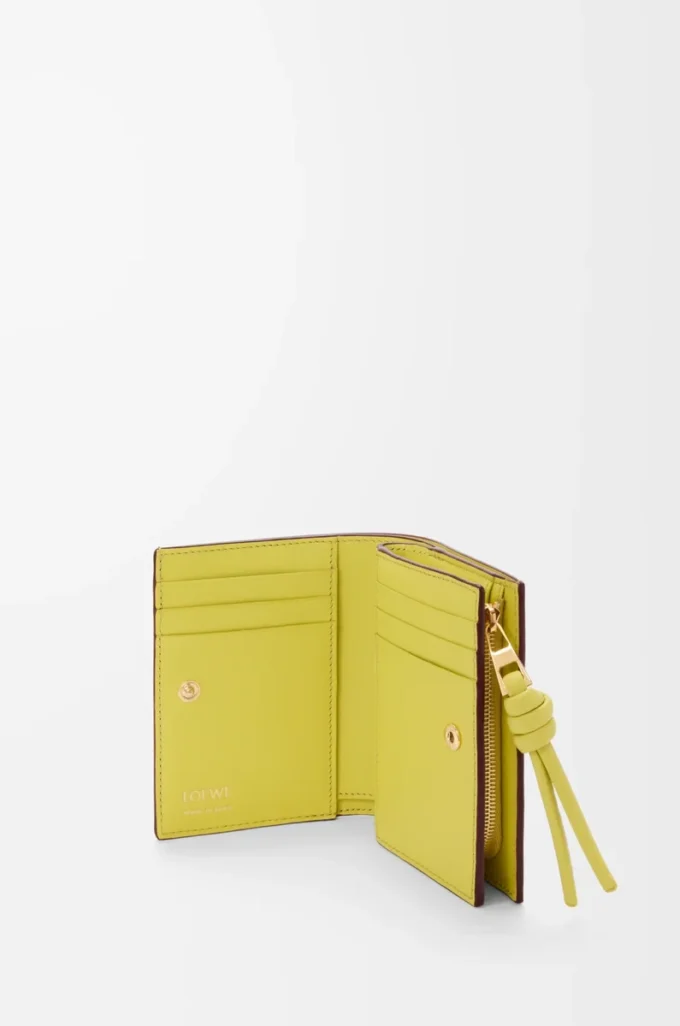 Knot compact wallet in shiny nappa calfskin Dark Burgundy/Light Citrine Knot compact wallet in shiny nappa calfskin Dark Burgundy/Light Citrine