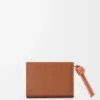 Knot compact wallet in shiny nappa calfskin Tan/Papaya Knot compact wallet in shiny nappa calfskin Tan/Papaya