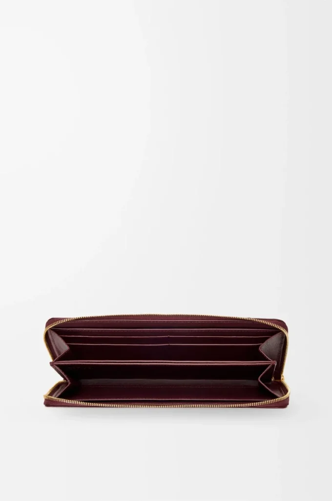 Knot slim zip around wallet in eel Dark Burgundy Knot slim zip around wallet in eel Dark Burgundy