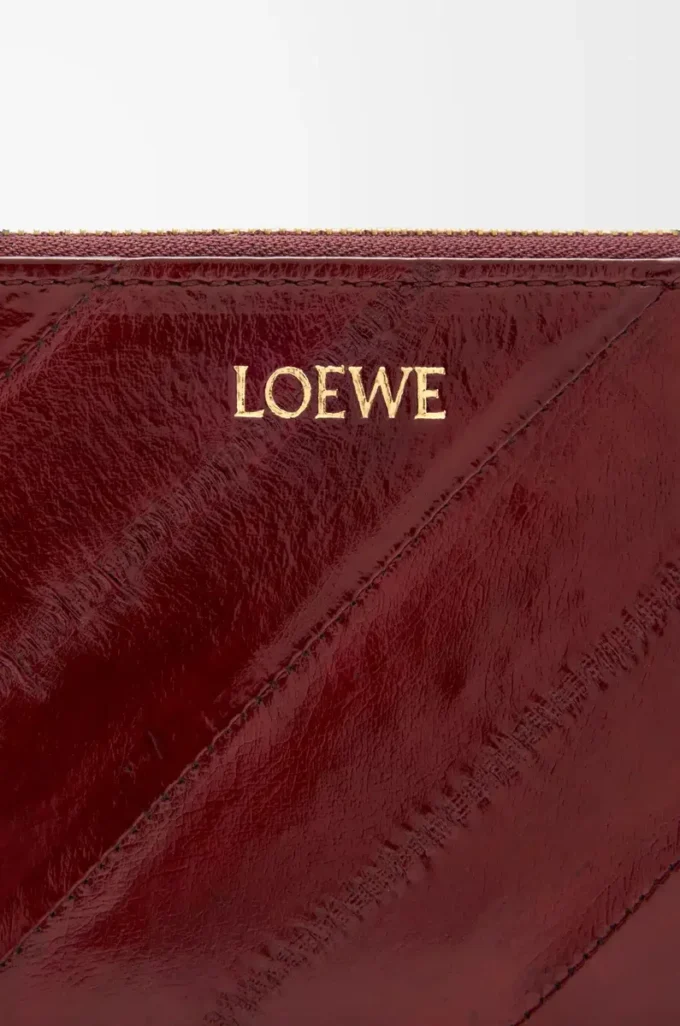 Knot slim zip around wallet in eel Dark Burgundy Knot slim zip around wallet in eel Dark Burgundy