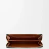 Knot zip around wallet in shiny nappa calfskin Black/Squirrel