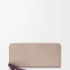 Knot zip around wallet in shiny nappa calfskin Clay/Plum