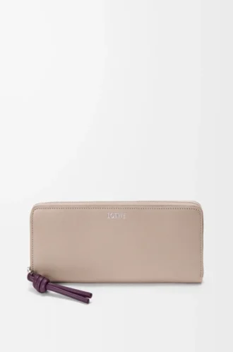 Knot zip around wallet in shiny nappa calfskin Clay/Plum