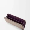 Knot zip around wallet in shiny nappa calfskin Clay/Plum