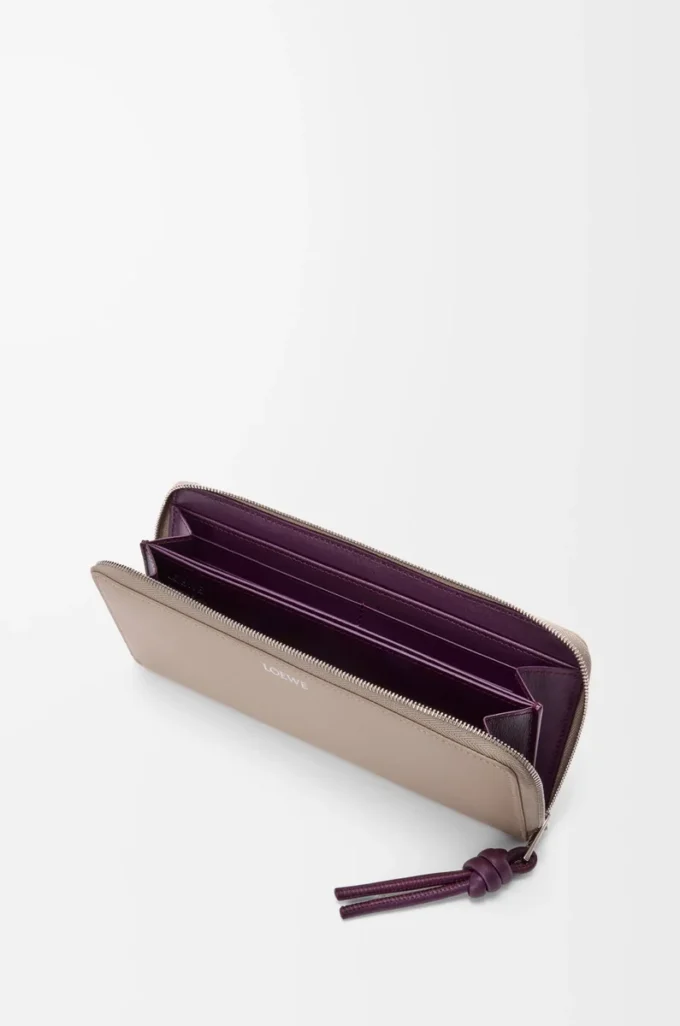 Knot zip around wallet in shiny nappa calfskin Clay/Plum
