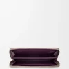 Knot zip around wallet in shiny nappa calfskin Clay/Plum