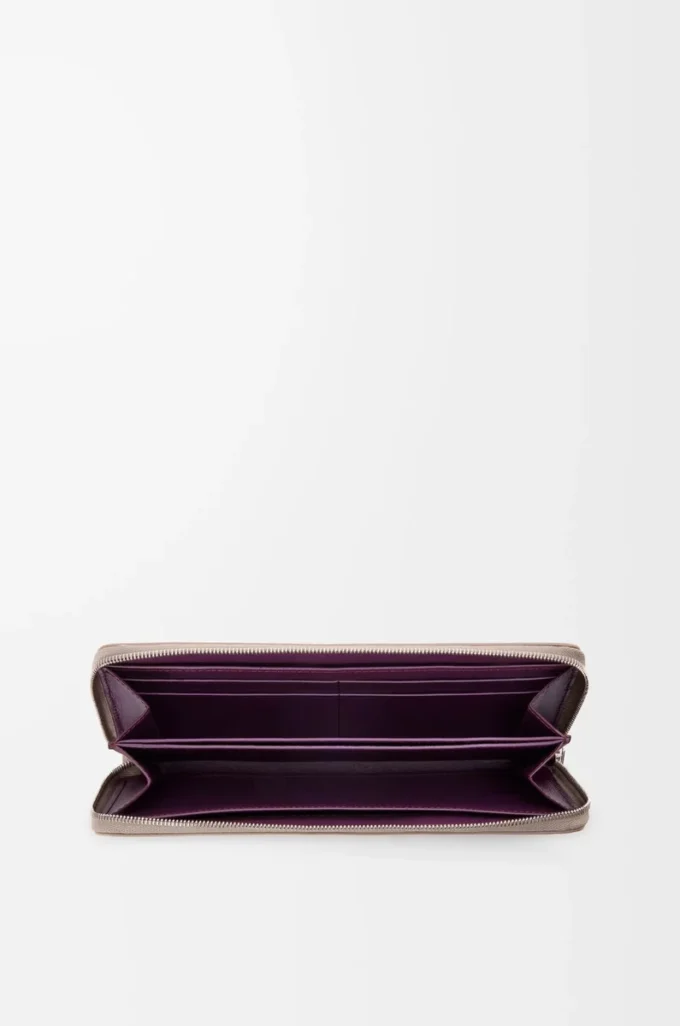 Knot zip around wallet in shiny nappa calfskin Clay/Plum