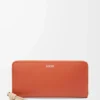 Knot zip around wallet in shiny nappa calfskin Maple/Papercraft
