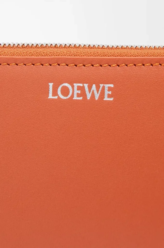 Knot zip around wallet in shiny nappa calfskin Maple/Papercraft