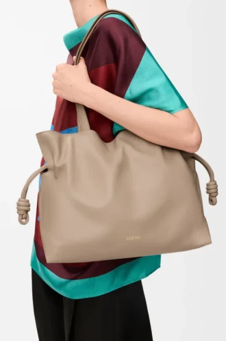 Large Flamenco clutch in nappa calfskin Sand