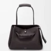 Large Madrid bag in supple grained calfskin Dark Ebony Large Madrid bag in supple grained calfskin Dark Ebony