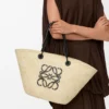 Medium Anagram Basket bag in iraca palm and calfskin Natural/Black