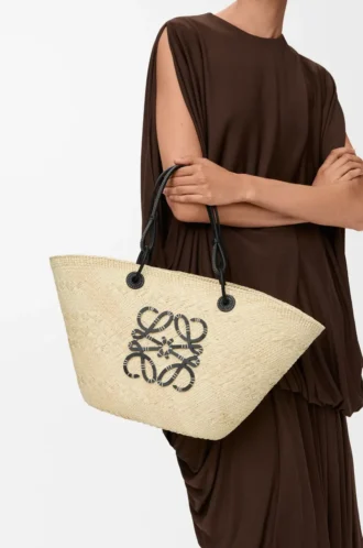 Medium Anagram Basket bag in iraca palm and calfskin Natural/Black