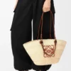 Medium Anagram Basket bag in iraca palm and calfskin Natural/Tan