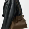 Medium Flamenco clutch in grained nubuck Tundra