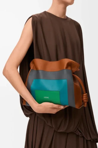Medium Flamenco clutch in nappa calfskin Caramel/Bright Green