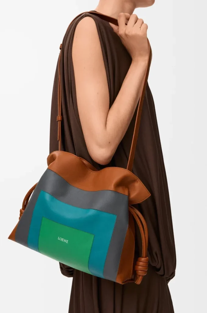 Medium Flamenco clutch in nappa calfskin Caramel/Bright Green Medium Flamenco clutch in nappa calfskin Caramel/Bright Green