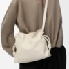 Medium Flamenco clutch in nappa calfskin Sea Salt Medium Flamenco clutch in nappa calfskin Sea Salt