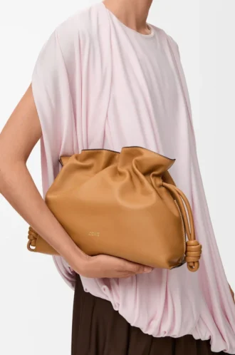 Medium Flamenco clutch in nappa calfskin Warm Desert
