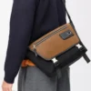 Medium Flex messenger in canvas and suede Black/Dark Gold Medium Flex messenger in canvas and suede Black/Dark Gold