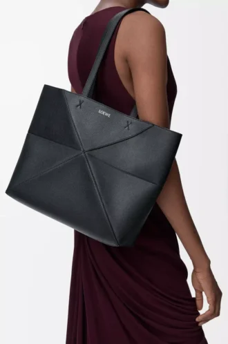 Medium horizontal Puzzle Fold tote in soft grained calfskin Black