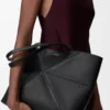 Medium horizontal Puzzle Fold tote in soft grained calfskin Black Medium horizontal Puzzle Fold tote in soft grained calfskin Black