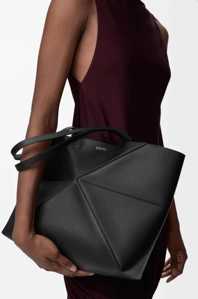 Medium horizontal Puzzle Fold tote in soft grained calfskin Black Medium horizontal Puzzle Fold tote in soft grained calfskin Black