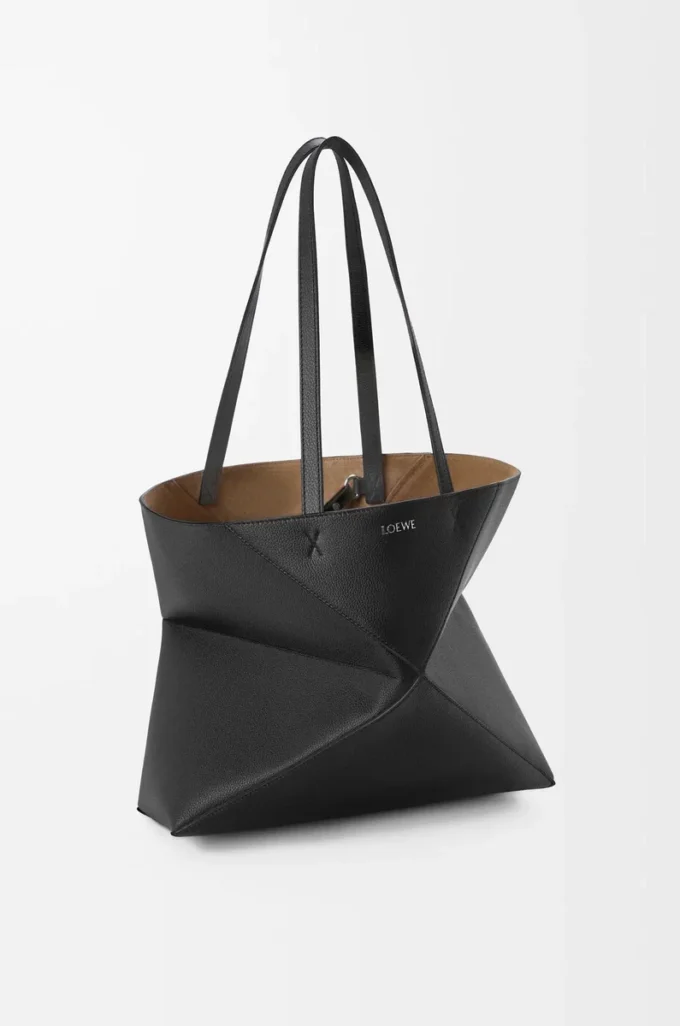 Medium horizontal Puzzle Fold tote in soft grained calfskin Black Medium horizontal Puzzle Fold tote in soft grained calfskin Black