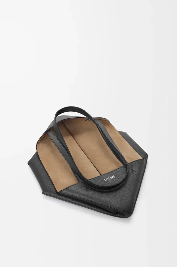 Medium horizontal Puzzle Fold tote in soft grained calfskin Black Medium horizontal Puzzle Fold tote in soft grained calfskin Black